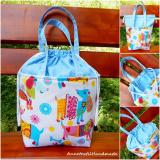 Tiny uzsonnás táska vidám színes ruhás kutyák